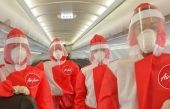 Air Asia: les agents de bord porteront une nouvelle combinaison à manches longues